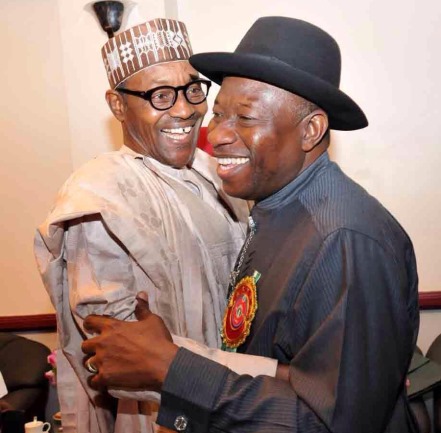 Goodluck Jonathan and Muhammadu Buhari embrace