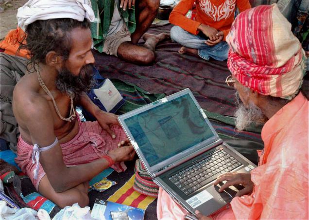 India slowest Internet penetration rate. uncle using laptop. Image from the hindu.