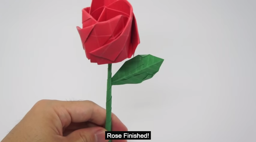 Video tutorial of how to fold an origami rose. Screen cap from YouTube.