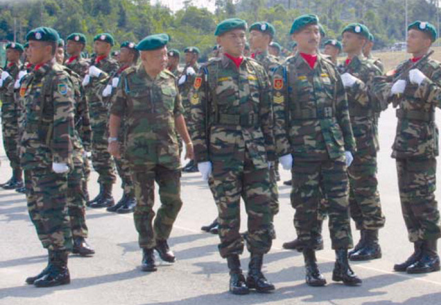 JMF in barracks uniform. Image from asianmil.typepad.com.