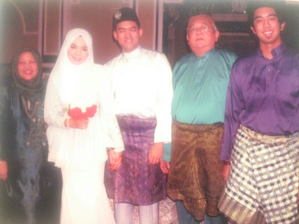 Meet the family. It's me, my father, my brother, his wife, and my mother from right to left. Image from family album