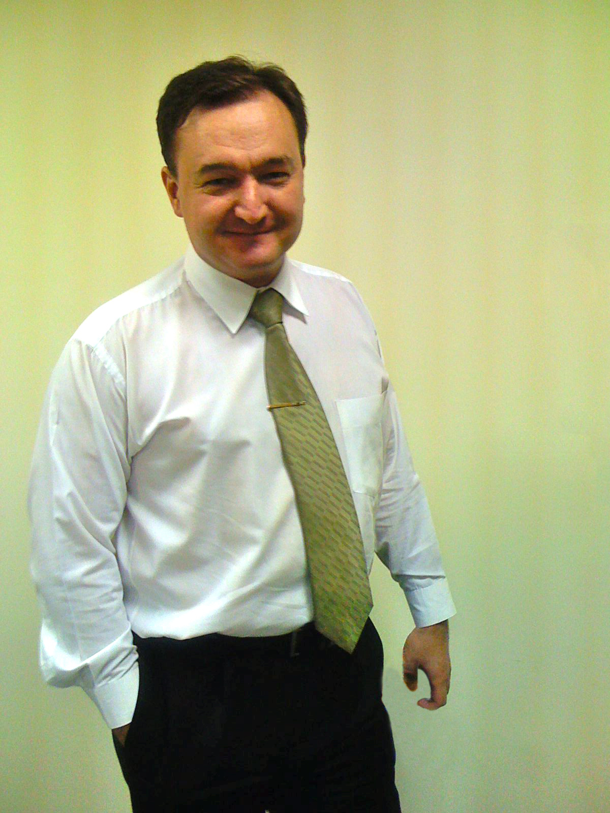 The once happy smile of Sergei Magnitsky. Image taken from billbrowder.com