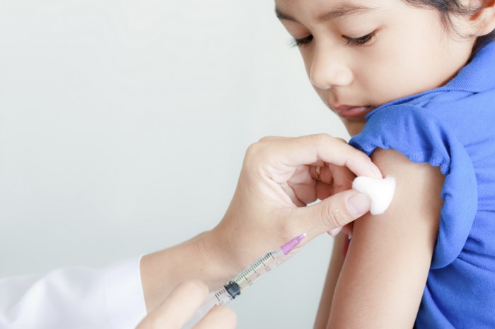doctor vaccinate injection jab child. Image from healthworks.my.