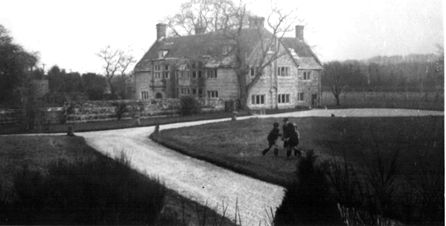 Almer-Manor-BB007’s-UK-home-with-his-children-playing-on-the-lawn