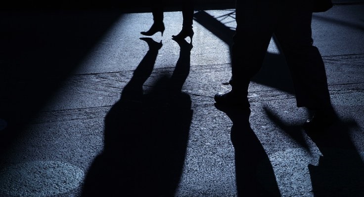 stalking shadow man woman. Image from International Business Times