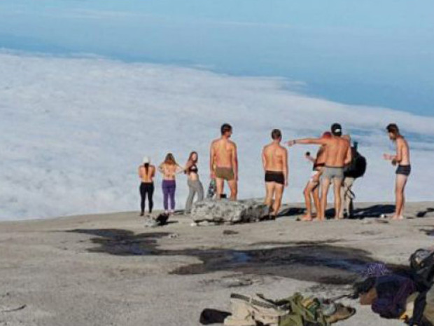 canadians posed nude sabah mountain earthquake. Image from 24news.ca.