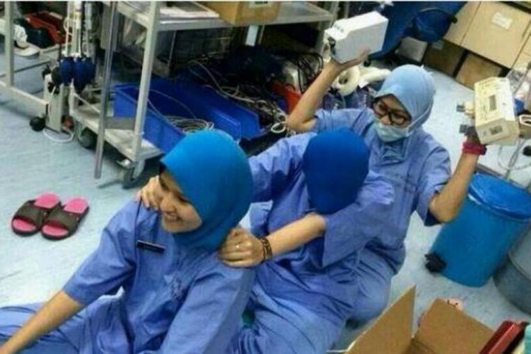 hospital nurse reenact bomoh Image from Straights Times