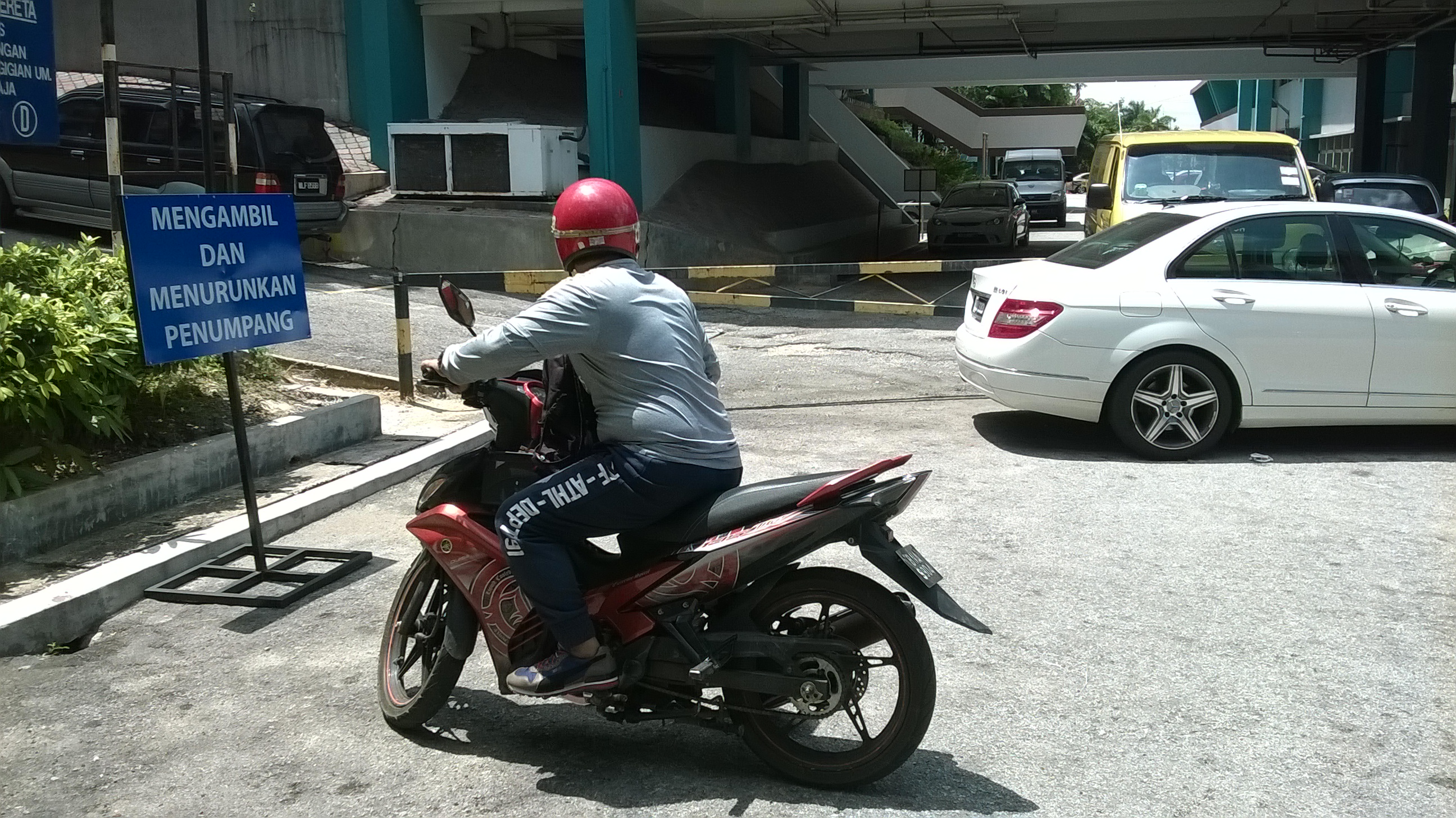 Halim says the methadone treatment helped save enough money to get his own motorbike.