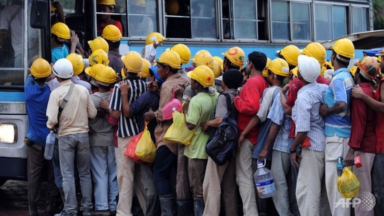 foreign-worker-kl-boarding-blue-bus-pekerja-construction-helmet