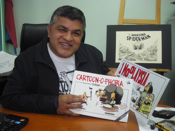 zunar showing cartoon-o-phobia book