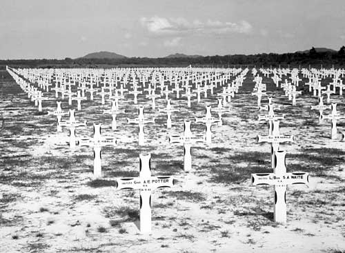 The bodies of the fallen POWs are collected and buried in a cemetery. Source 
