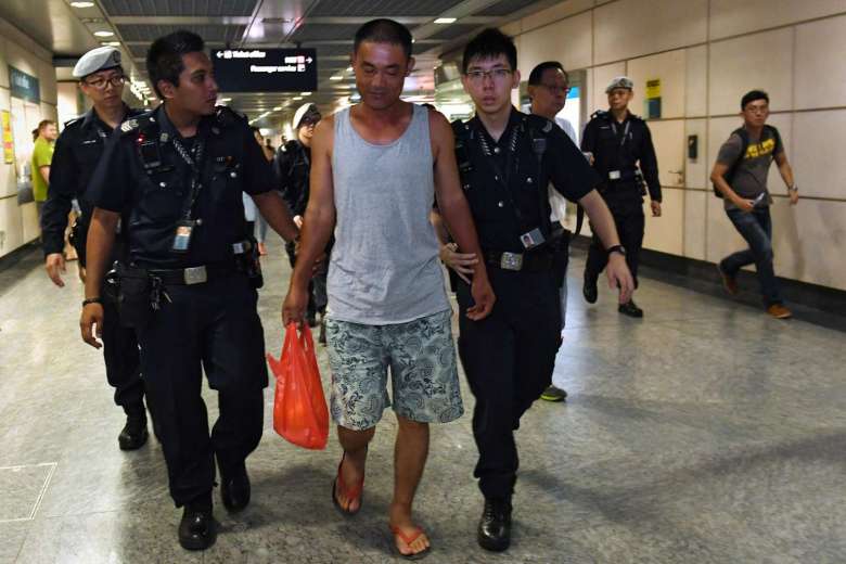 singapore mrt man arrested unattended bag