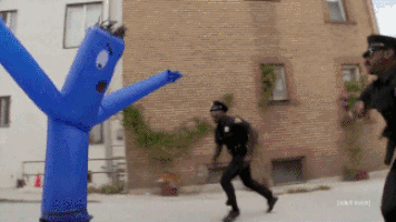 police smack blue flailing man