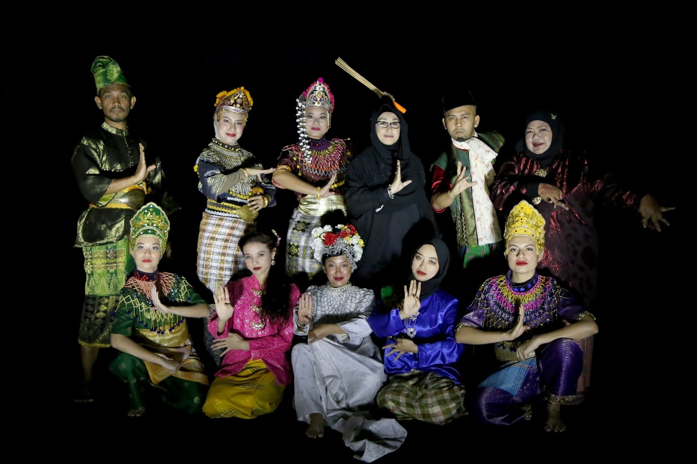Norzizi (back row, third from right) and the cast and crew of Mak Yong Titis Sakti.