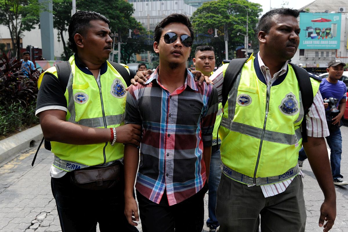 Gee.. thanks guys. Malaysia student activist Fahmi Zainol © is detained by policemen during a rally to demand for Malaysian Prime Minister Najib Razak to be arrested and charged over alleged financial scandal outside a shopping mall in Kuala Lumpur on August 1, 2015. The Malaysian Insider/Najjua Zulkefli