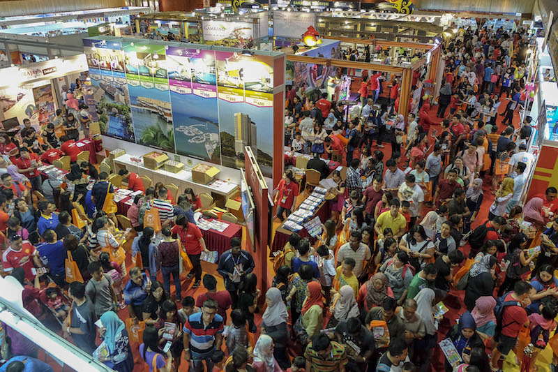 To do it online or to squeeze through a travel fair? Yeah... no thanks. Photo from themalaymailonline.com