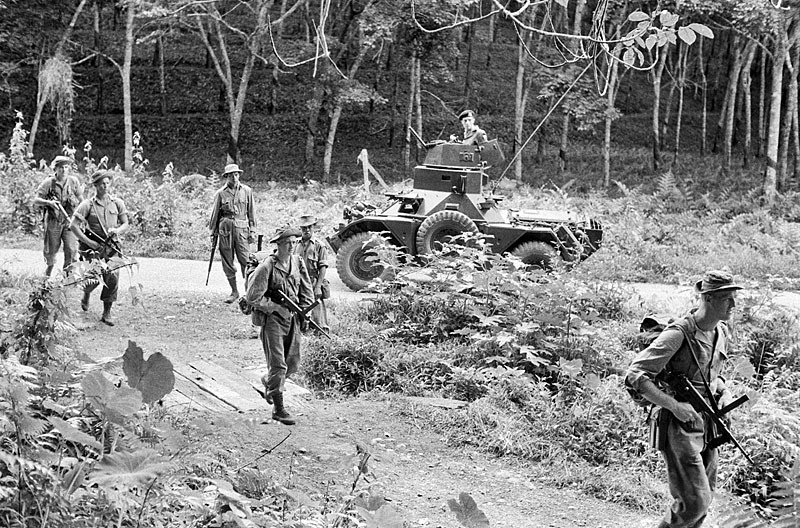 The communists prolly didn't have good photographers, so here'a s picture of some British soldiers patrolling in 1956 Perak. Img from Weapons and Warfare.