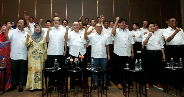 The Sabah UMNO members who collectively told the party 'um... no more'. Image from NST