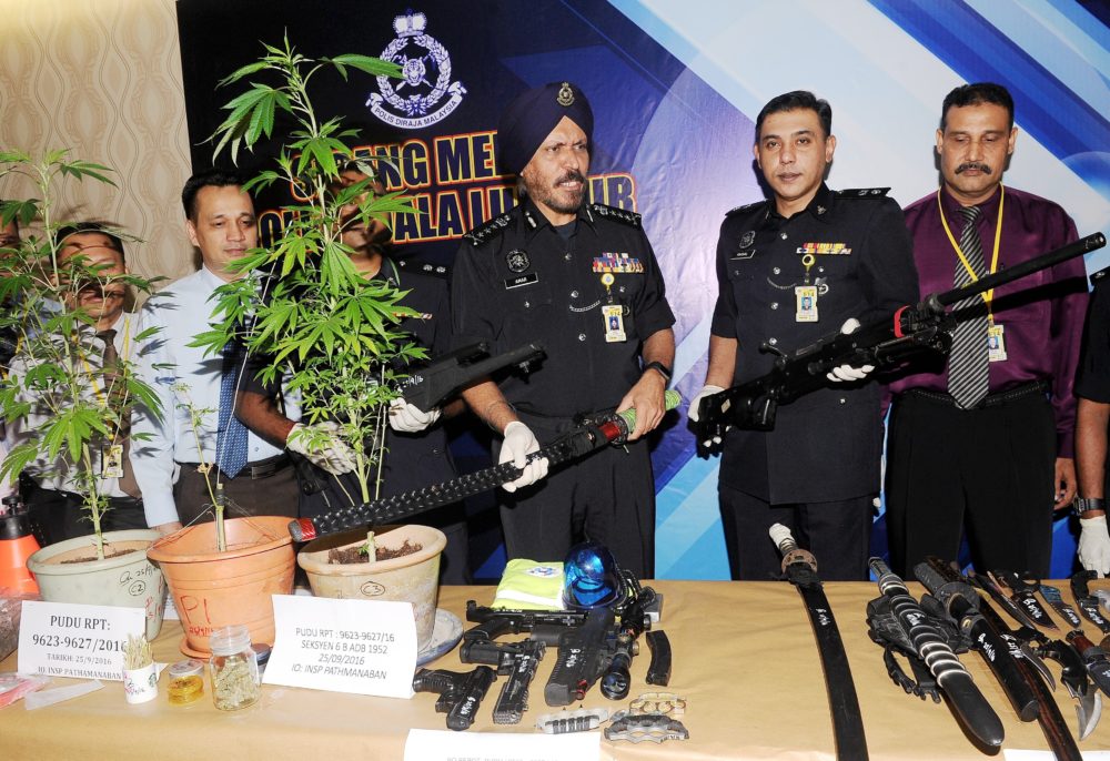 Looking at the seized items, this could have been a movie instead. Image from Borneo Post.