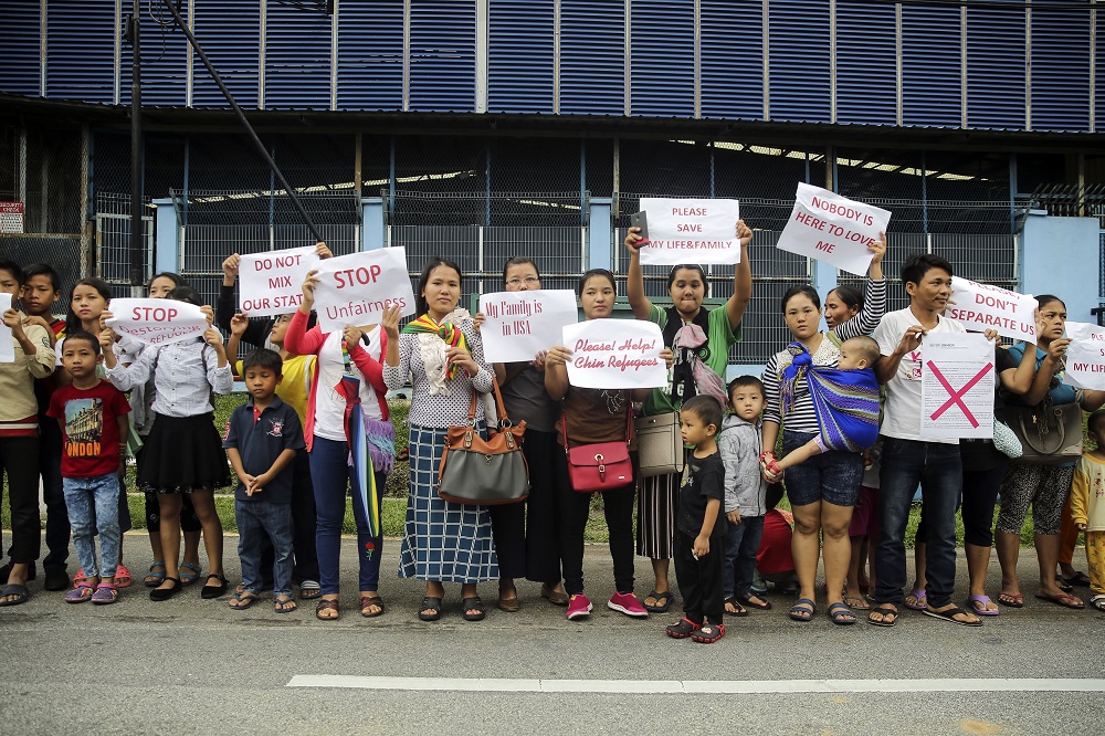Chin refugees protesting outside the UNHCR building in KL in June last year. Img from MalayMail.