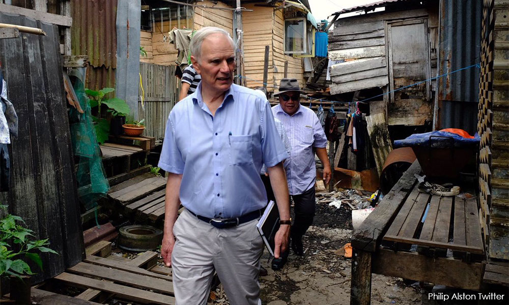 Dilapidated houses. This ang moh is the UN Special Rapporteur, Philip Alston. Img from Malaysiakini