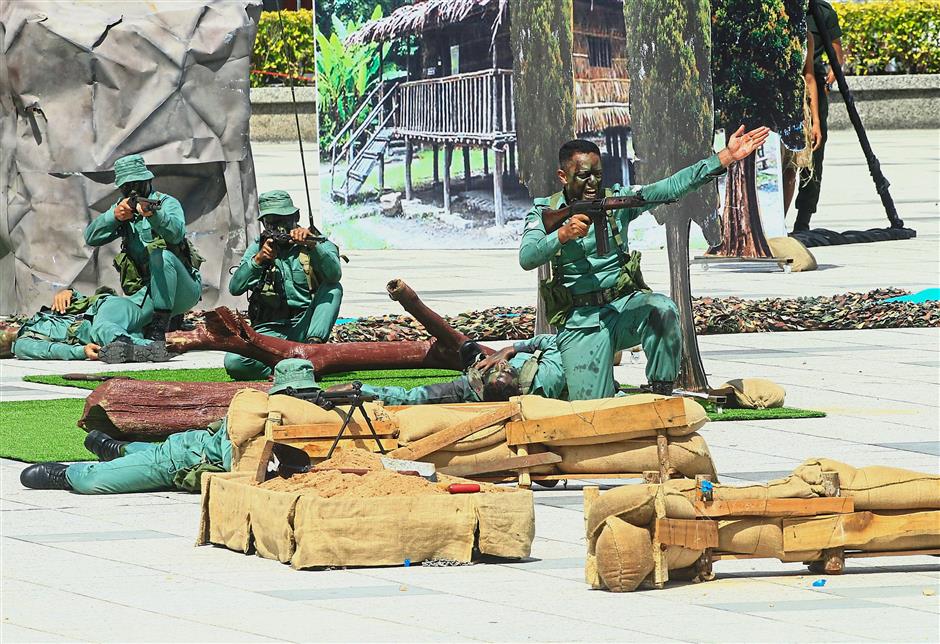 Reenactment of Ops Iblis, during which its leader Kapt. Mohana was killed. Image from: The Star Online