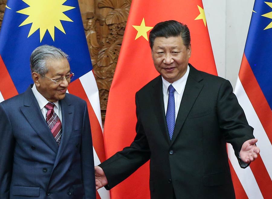 Tun and Xi, shortly before returning to the 100 Acre Wood for a pot of honey. Image from: China Daily