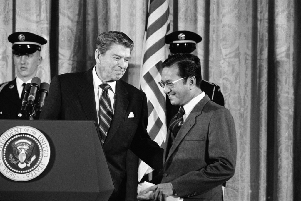 Dr. M and President Reagan in 1984. Image from: Bloomberg