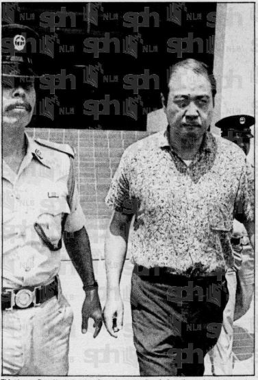Khoo Ban Hock leaving a Bruneian court. Image from NewspaperSG