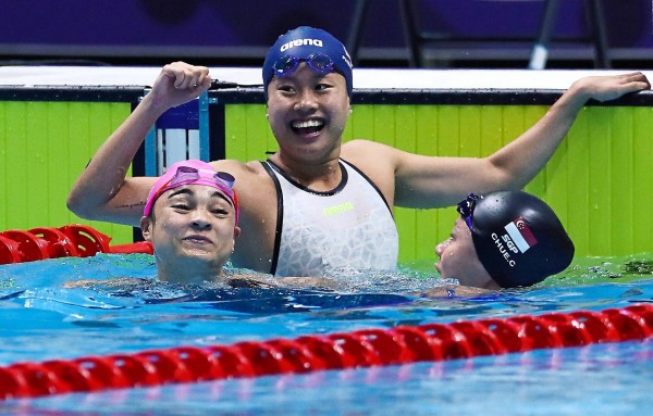Phee Jinq En (blue cap), who managed to snag two golds at the 2019 SEA Games. Image from the Star