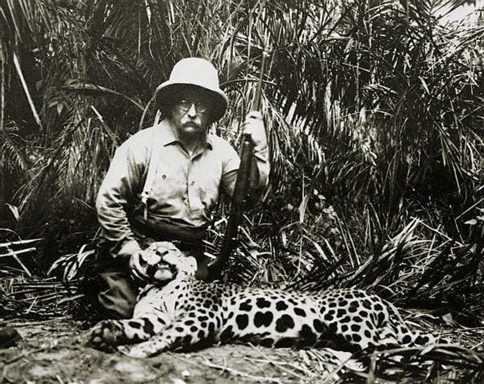 Teddy posing with a jaguar. Img from Wide Open Spaces.