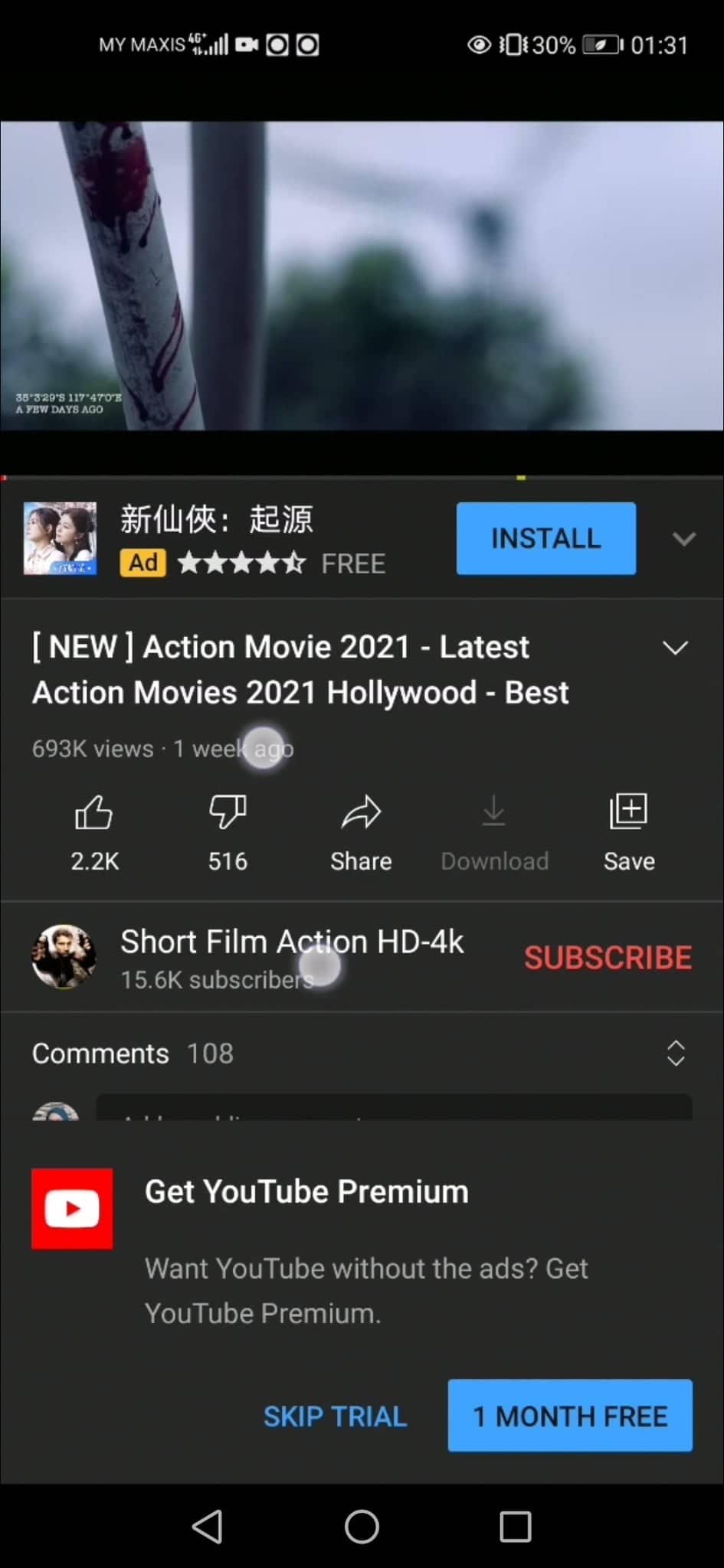 YouTube screenshot showing how to pause a video using two fingers.