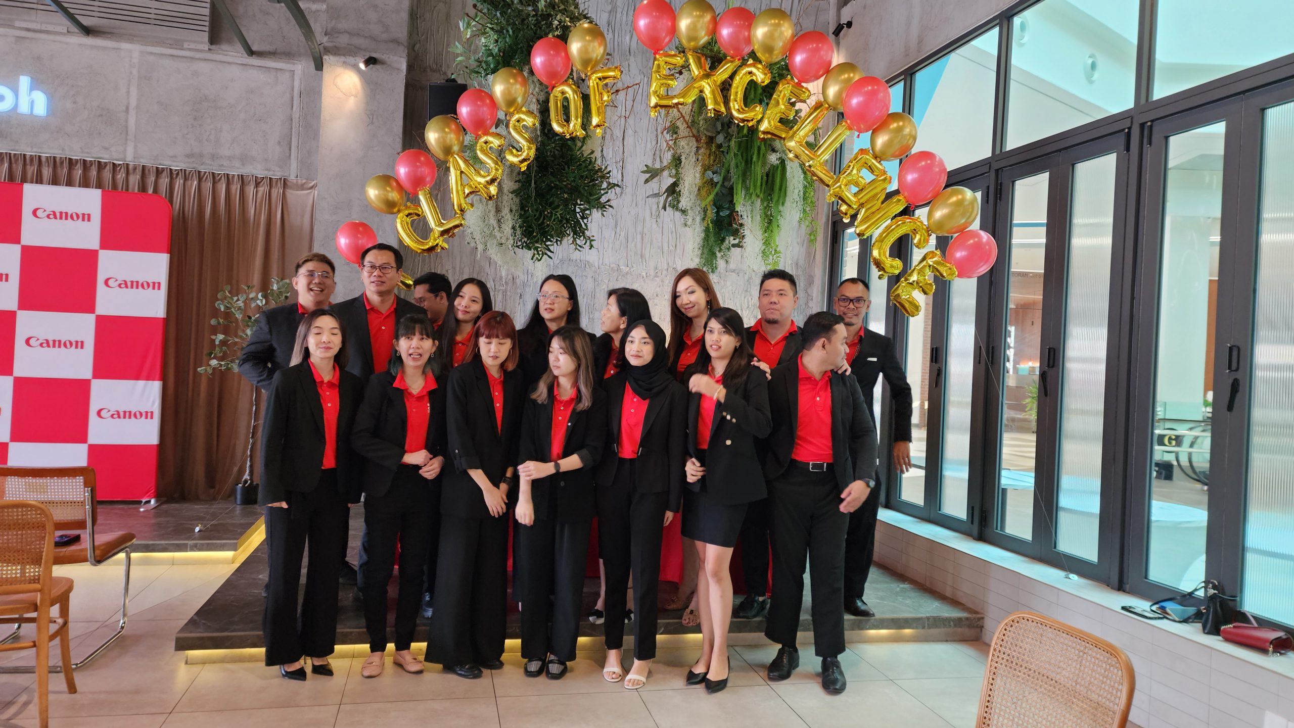 Group photo of Canon Malaysia staff at the printer launching event.