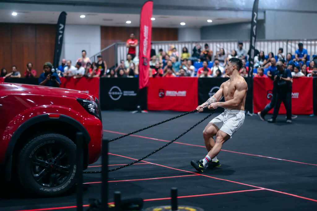 Pulling a two-tonne truck over the finish line at the REDLINE Fitness Games Powered By Nissan.